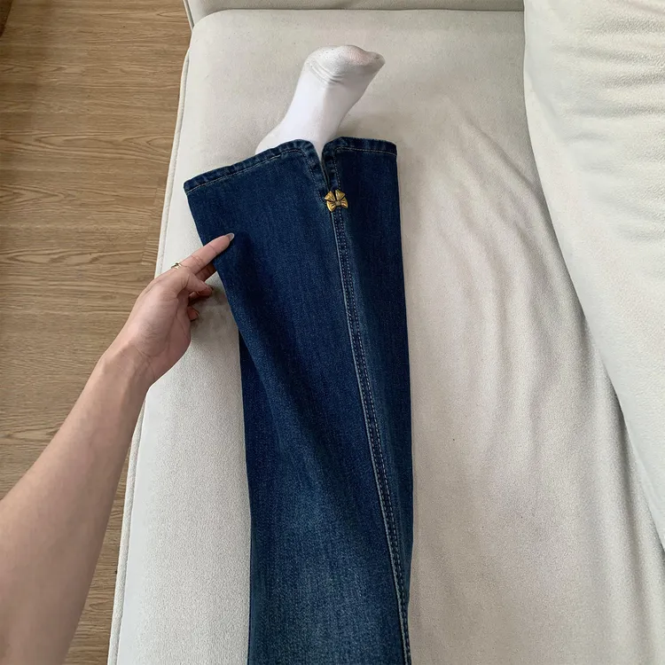 设计感侧开叉微喇牛仔裤女秋胖妹妹大码高腰蝴蝶结不贴腿阔腿裤子