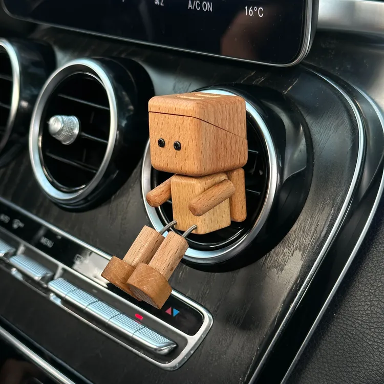 可爱抖腿小木仔汽车内饰品轻奢车载摆件出风口香薰祛异味清新空气