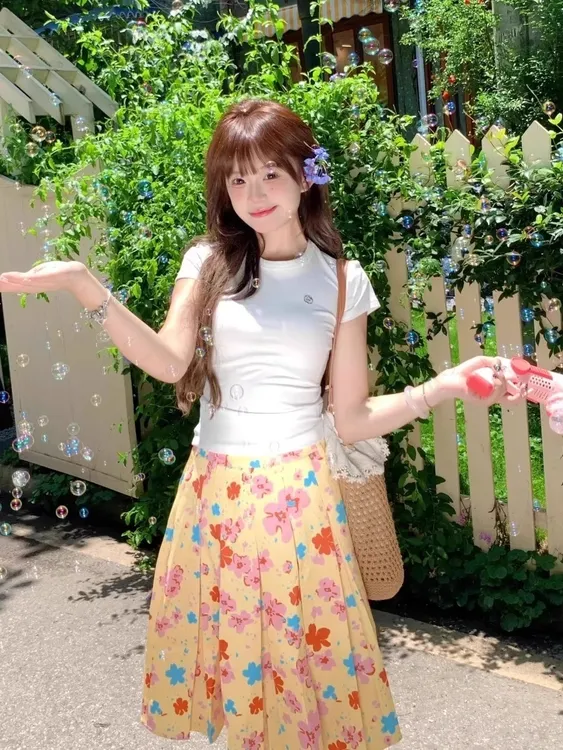 法式复古黄色印花盛夏花园半身裙女2025夏季百褶裙子碎花韩版时尚