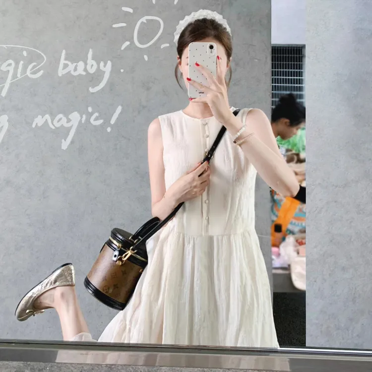 法式白色无袖背心连衣裙子女夏季2025新款海边度假高级感长裙5969