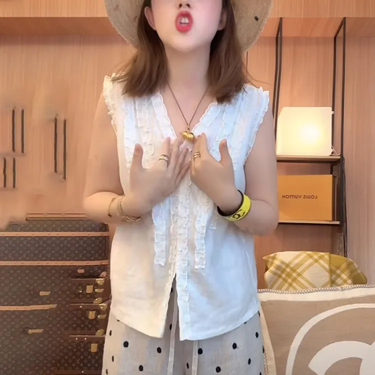 木耳边白色无袖衬衫女士2025夏季宽松显瘦洋气减龄设计感亚麻上衣