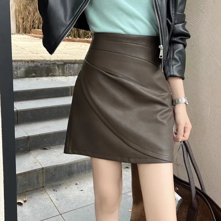 不规则咖色PU皮半身裙女秋季2025新款气质高腰显瘦包臀短裙A字裙