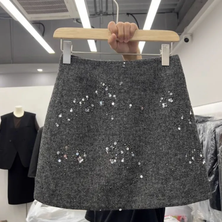 秋冬新款高腰显瘦百搭亮片防走光毛呢A字短裙女半身裙裙