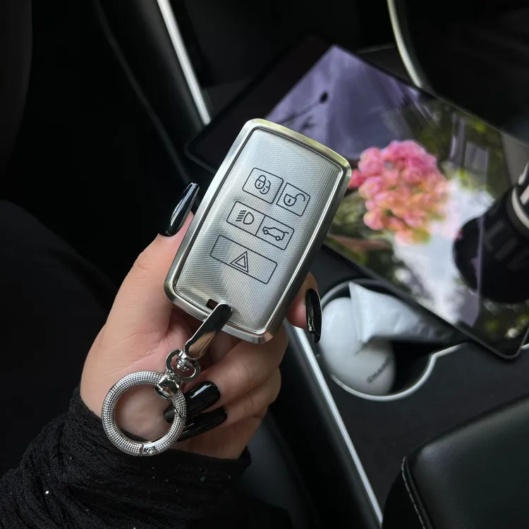 适用于路虎钥匙套卫士110极光时尚创意壳发现运动个性小众男女扣