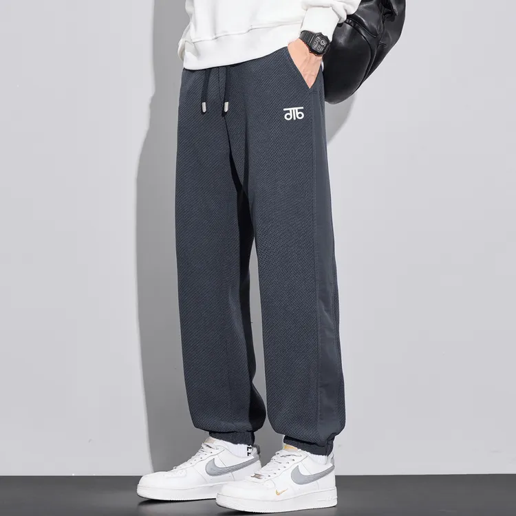 男士运动束脚休闲裤2025秋季新款青少年宽松直筒潮流百搭哈伦裤子