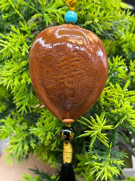 橄榄核精雕三面百福百财寿字把件车挂手球