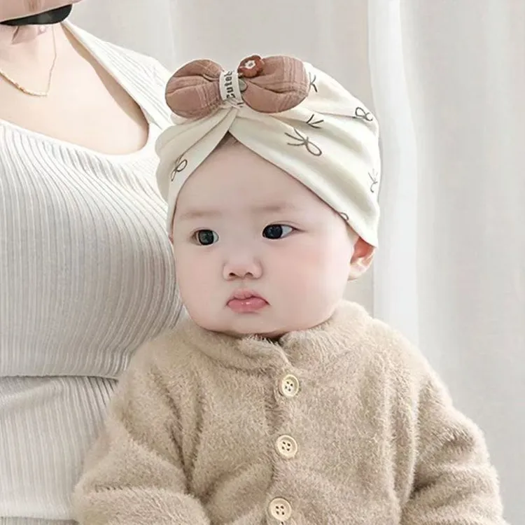 宝宝帽子春秋季蝴蝶结套头帽新生儿0-6月婴幼儿护囟门胎帽包头帽