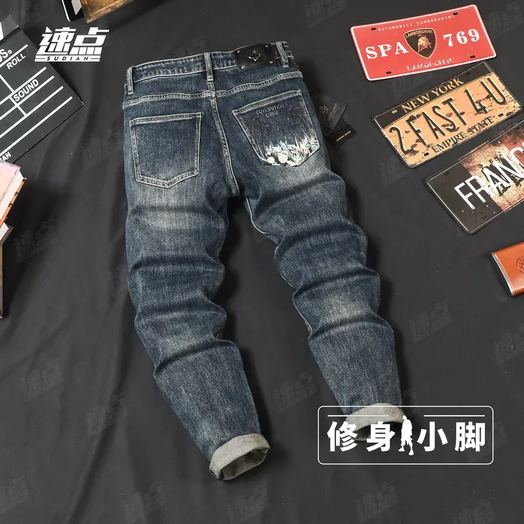 （长裤）秋季新款涂鸦印花牛仔裤男潮牌痞帅压花休闲弹力修身小脚裤