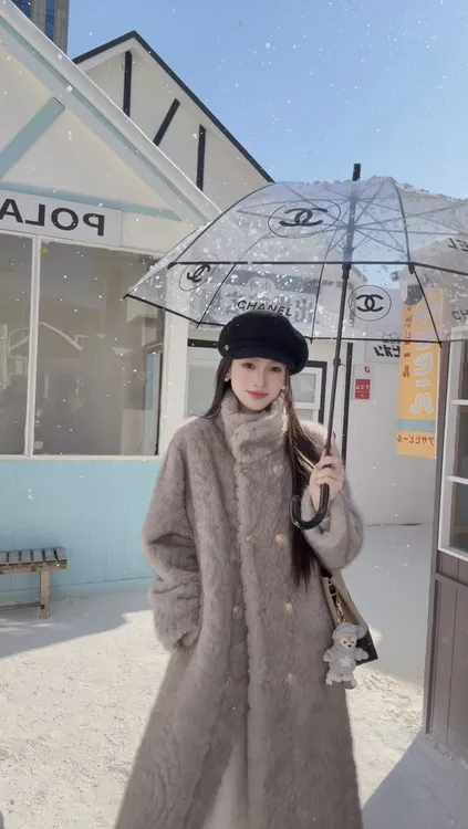 冬新款小立领环保毛毛外套加厚皮毛一体千金风长款大衣