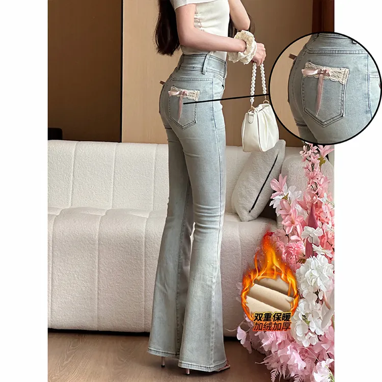 加绒蝴蝶结蕾丝拼接微喇牛仔裤女2025冬季新款提臀显瘦喇叭长裤