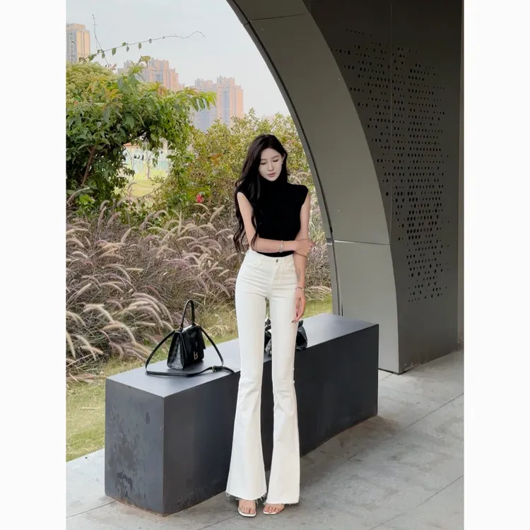 白色毛边高腰弹力紧身牛仔裤女2025年秋季新款显瘦显高喇叭长裤