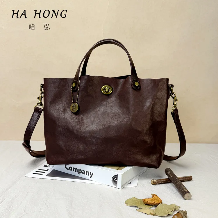 哈弘植鞣皮手提斜挎包包四季通用韩系慵懒风2025独特超好看百搭