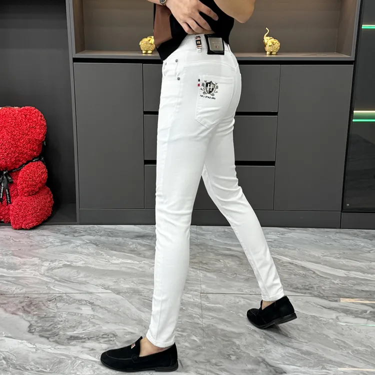 欧洲站白色牛仔裤男春秋季潮流修身百搭小脚裤青年舒适休闲长裤子