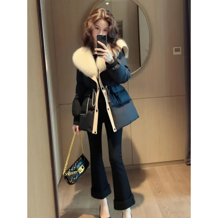 冬季棉服女款2025新款独特超好看高端气质收腰黑色毛领夹棉外套厚