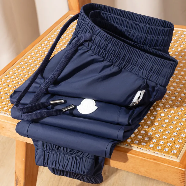 高端夏季轻薄冰丝速干运动裤男修身束脚时尚口袋拉链男士九分裤