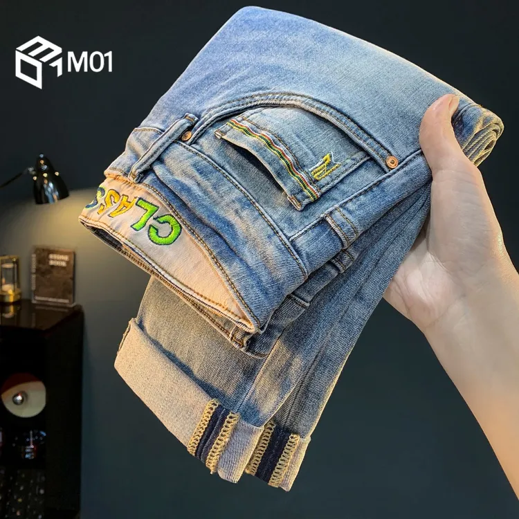 M01高端牛仔裤夏季新款潮流修身小脚长裤微锥中腰绣花弹力休闲裤
