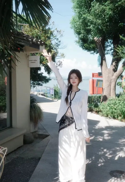 白色镂空长袖针织开衫女早秋纯欲辣妹设计感修身显瘦气质百搭上衣
