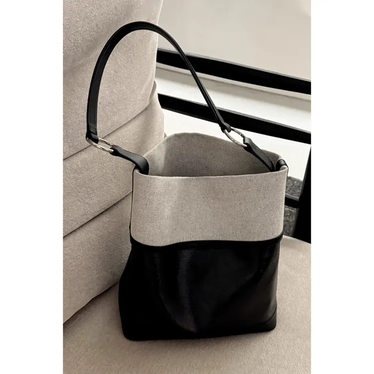 精致拼色休闲包包女2025新款轻奢小众高级感水桶包百搭单肩斜挎包