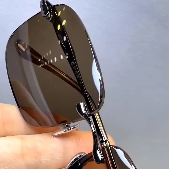 东海水晶茶色太阳镜中老年高档男款无边框时尚百搭防水晶眼镜