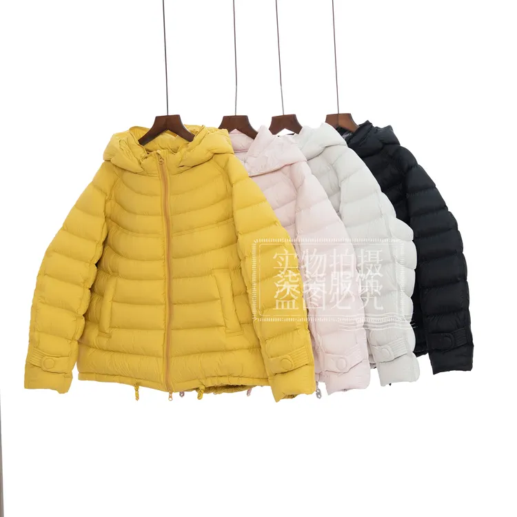 90白鸭绒黄色排骨羽绒服2025冬新款巨好看连帽加厚保暖短款外套女