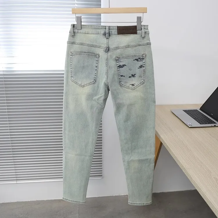 浅色复古刺绣牛仔裤男士2025春夏新款韩版修身小脚时尚刺绣男裤子