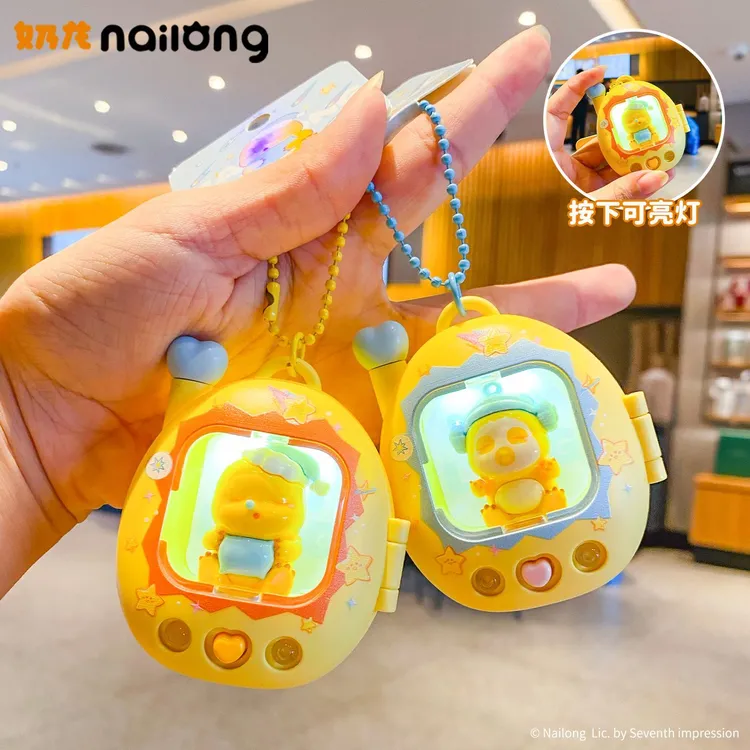 正版口袋奶龙发光钥匙扣挂件创意口袋超萌公仔书包挂件卡通小挂饰