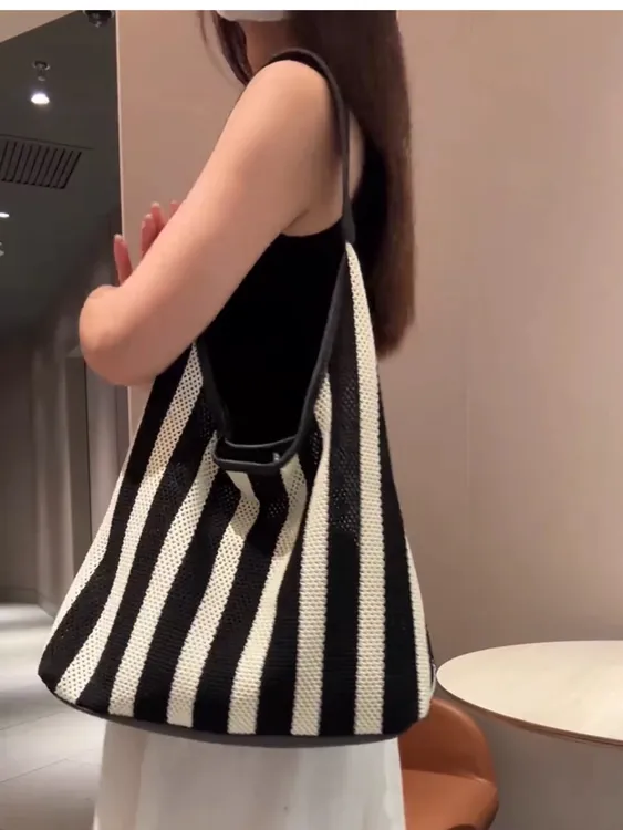 黑白条纹镂空编织包包女式2025新款轻奢小众高级感大容量托特大包
