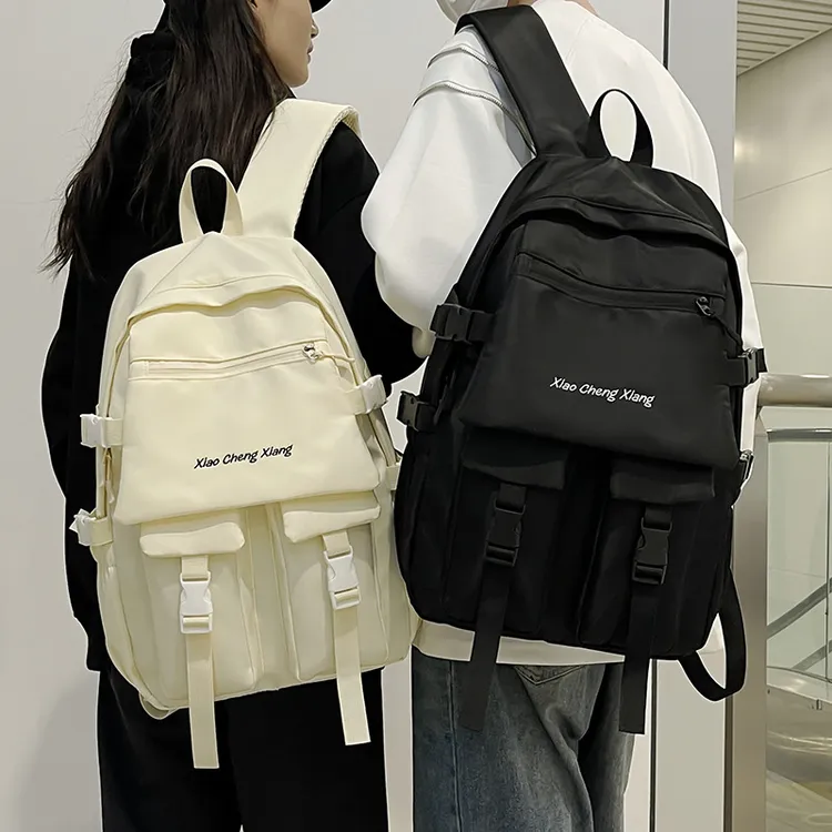 春夏季简约旅行双肩背包电脑背包休闲纯色百搭初高中生大容量书包