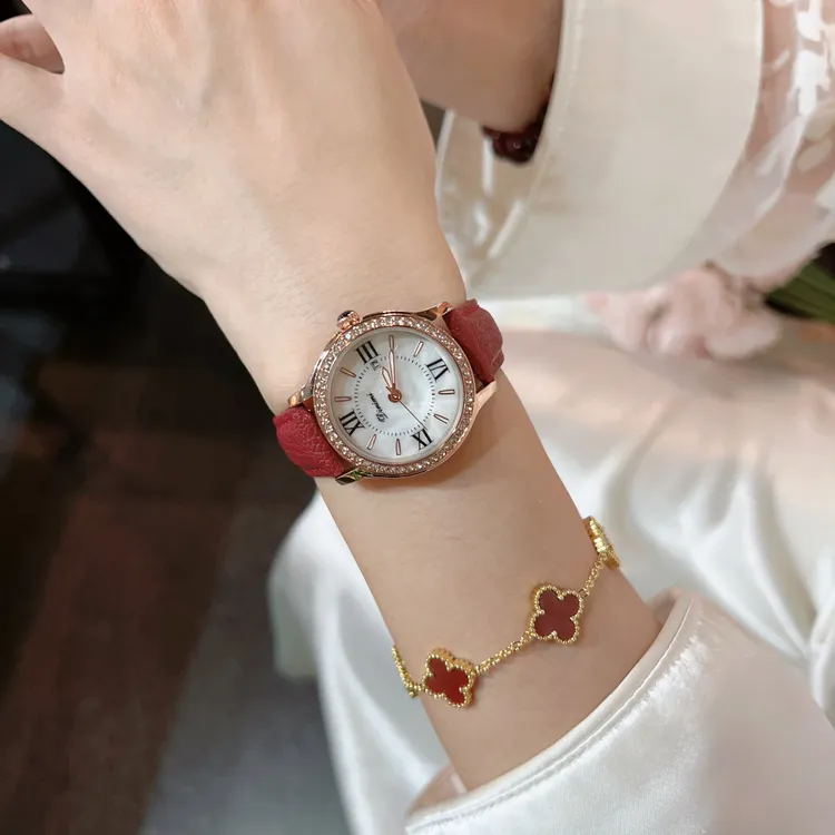 Dinimi镶钻表壳贝母表盘指针带夜光带日历简约轻奢女款防水腕表