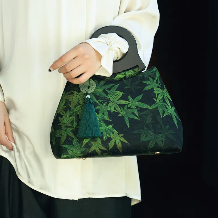双姊妹原创大容量香云纱木柄手提手腕包流苏旗袍新中式配包2025