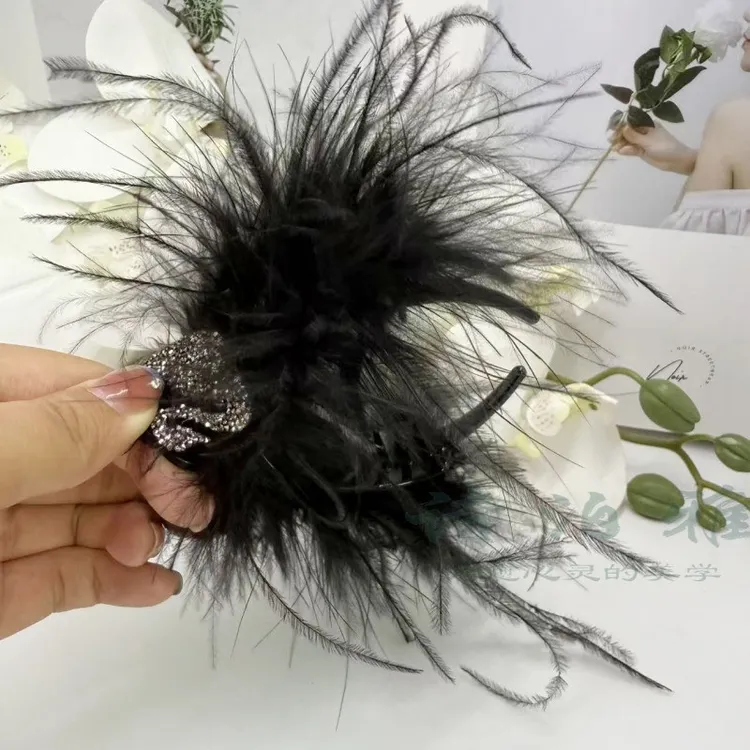 新款网红小天鹅羽毛抓夹丸子头丸子夹鸵鸟毛气质百搭发夹头饰发饰