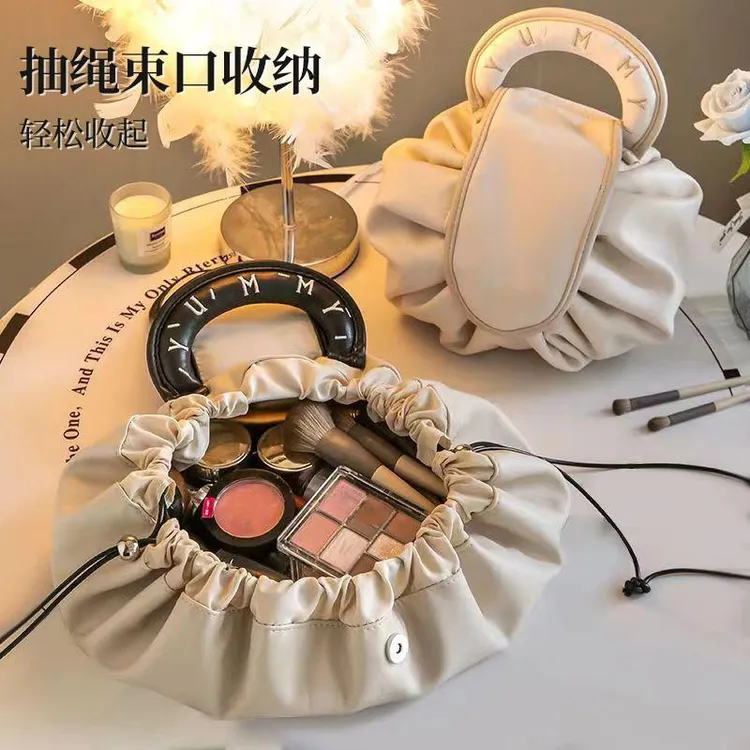 懒人化妆包女便携大容量化妆品收纳包旅游防水袋抽绳洗漱包简约