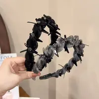 蝴蝶结水钻带齿发箍女高级感新款波浪发卡防滑高颅顶洗脸头箍头饰