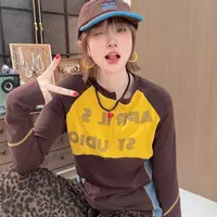 Apr.【旋风少女】秋季新款时尚撞色拼接印花长袖半开领T恤女25ST554