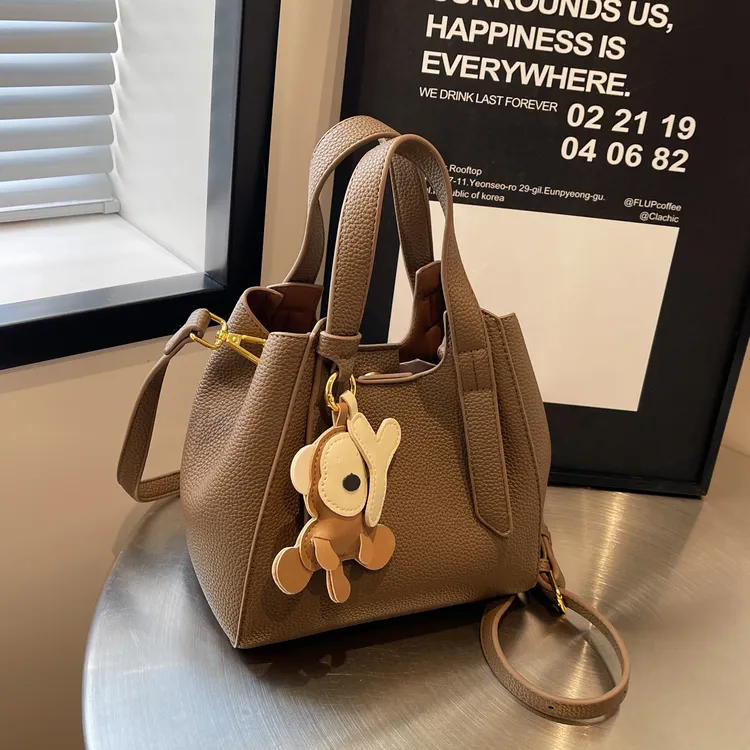 时尚通勤复古百搭小众设计湖泊流光风菜篮子单肩斜挎子母包F139