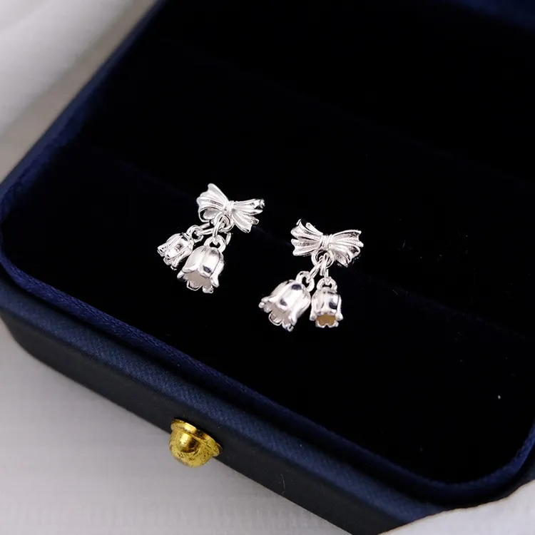 足银耳饰 999纯银铃兰花蝴蝶结耳钉女小众设计感轻奢气质耳环简约