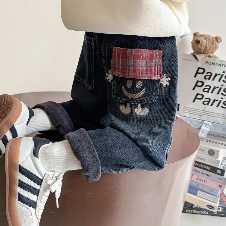 女童加绒裤子2025冬季洋气时髦儿童笑脸格子牛仔裤宝宝一体绒裤子