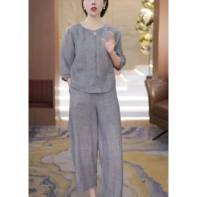 时尚休闲宽松套装女2025夏季新款设计感气质显瘦上衣直筒裤两件套