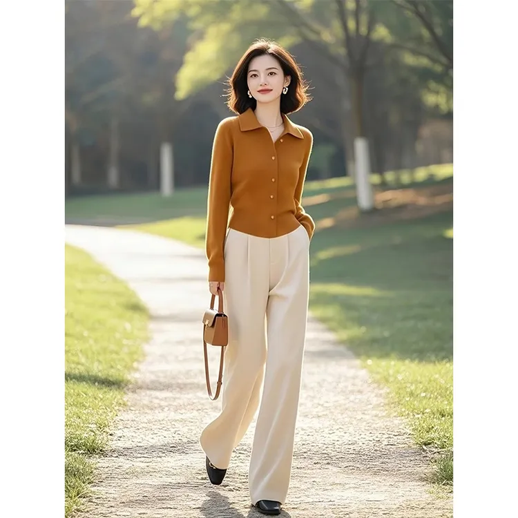 今年流行的独特漂亮小个子高级感黄色针织衫白色裤子套装女早春季