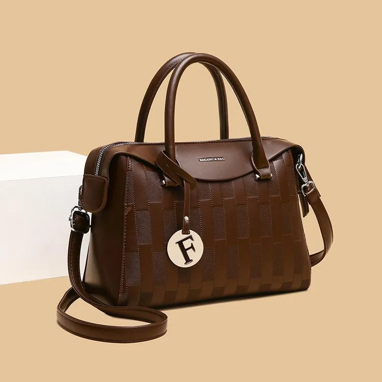 米琦袋鼠今年流行波士顿包2025新款时尚高级感软皮枕头包斜挎包女