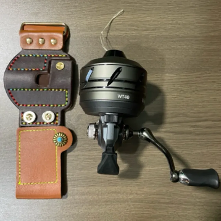 万品WT40自动排线渔轮不卡线全金属设计黄铜齿轮大线杯