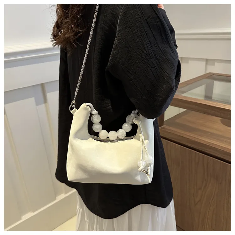 潮袋星球2025新中式珍珠手提包包女新款小众百搭链条斜挎包手提包
