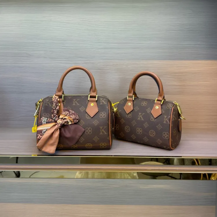 优库迪斯UK定制新款经典轻奢百搭单肩手拎斜挎枕头包