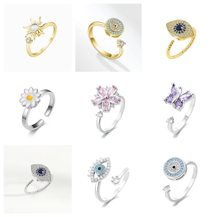 亚马逊外贸款欧美高级感旋转戒指缓解压力铜微镶蝴花朵戒指转动戒