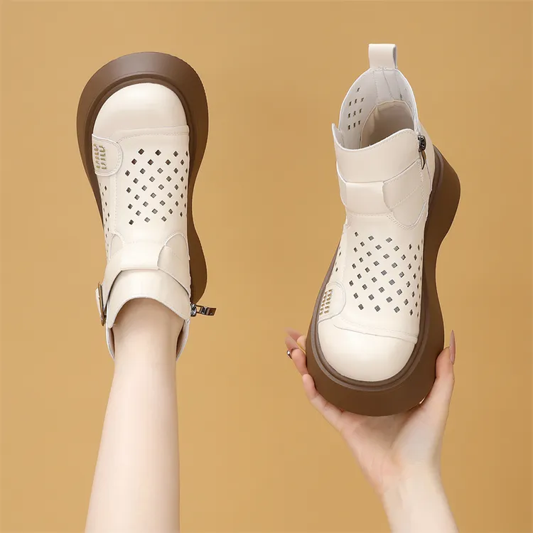 2025女薄款圆头春夏季休闲风镂空马丁靴时尚白色平底厚底洞洞单靴