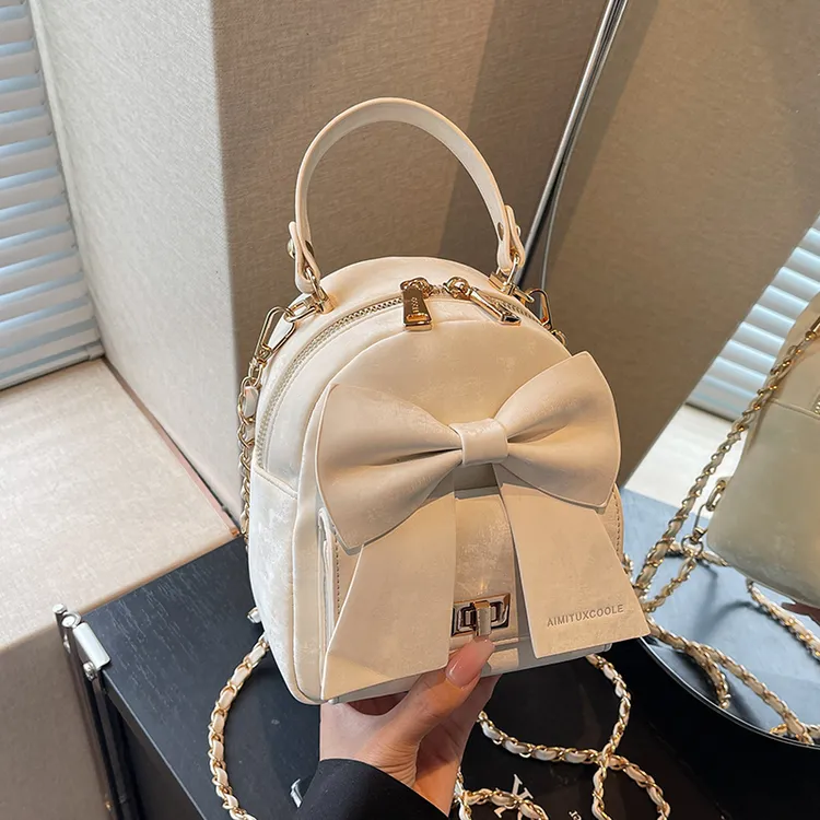 艾米兔女包2025新款时尚简约蝴蝶结日常百搭休闲小众手提双肩包