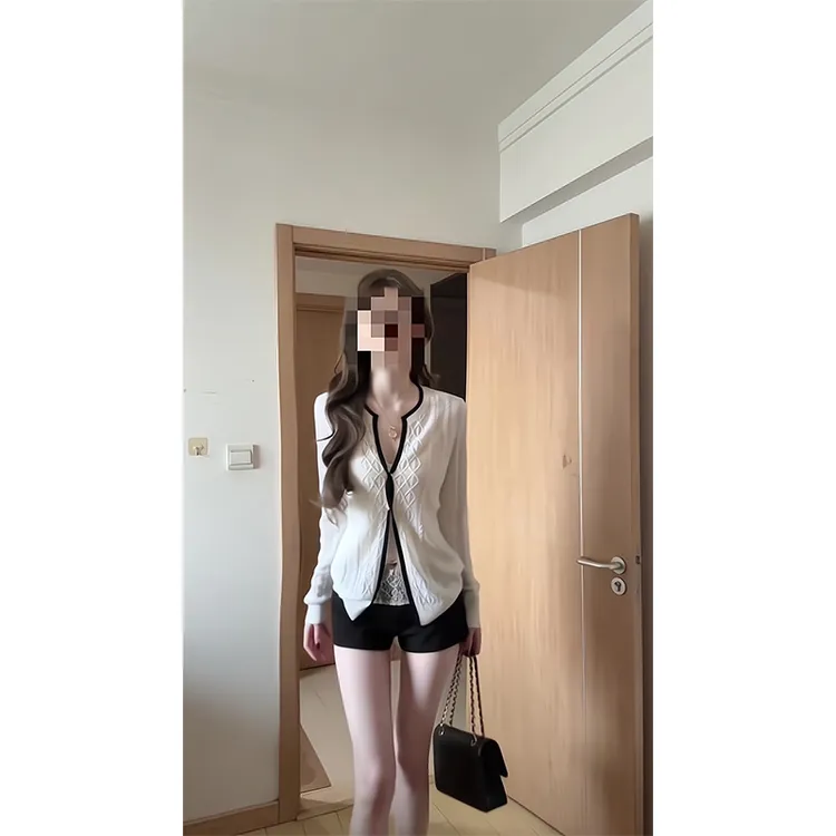 镂空V领针织开衫女秋季2025新款独特设计感长袖上衣高腰显瘦短裤