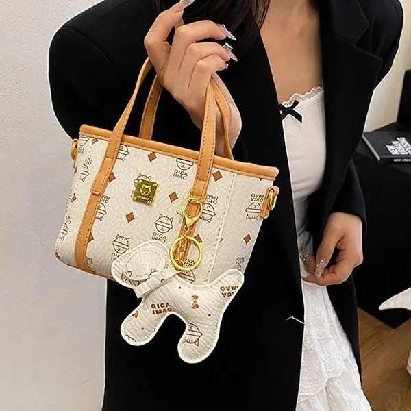 高级感印花手拎水桶包女2025新款菜篮子托特包百搭通勤单肩斜挎包