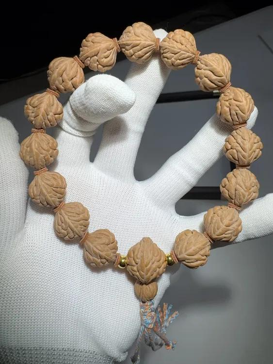 龙纹桃核手串疙瘩龙原皮原色手持