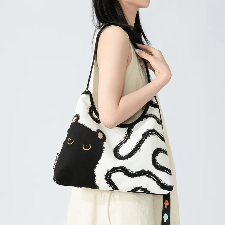 艺术鸭原创小煤球休闲潮流时尚单肩包小众百搭新月手提斜挎包包女